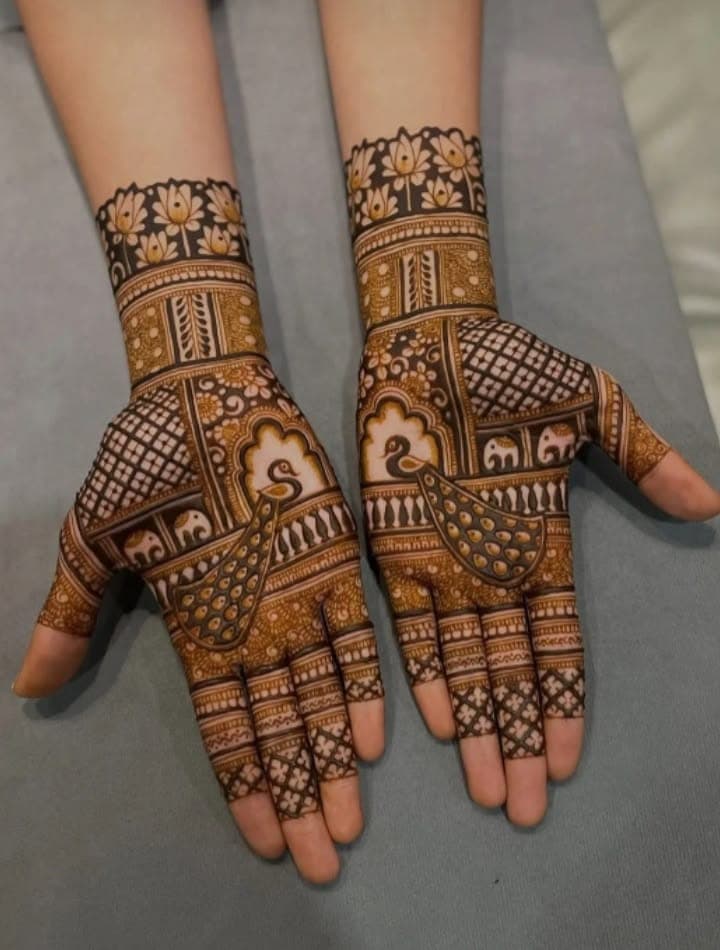 Luxurious bridal mehndi design on hands